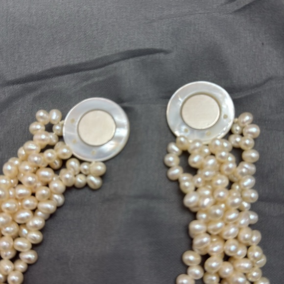 Salt Water Pearl Necklace
6 strand / 18 inches 
Magnetic mother of pearl clasp - Picture 5 of 7